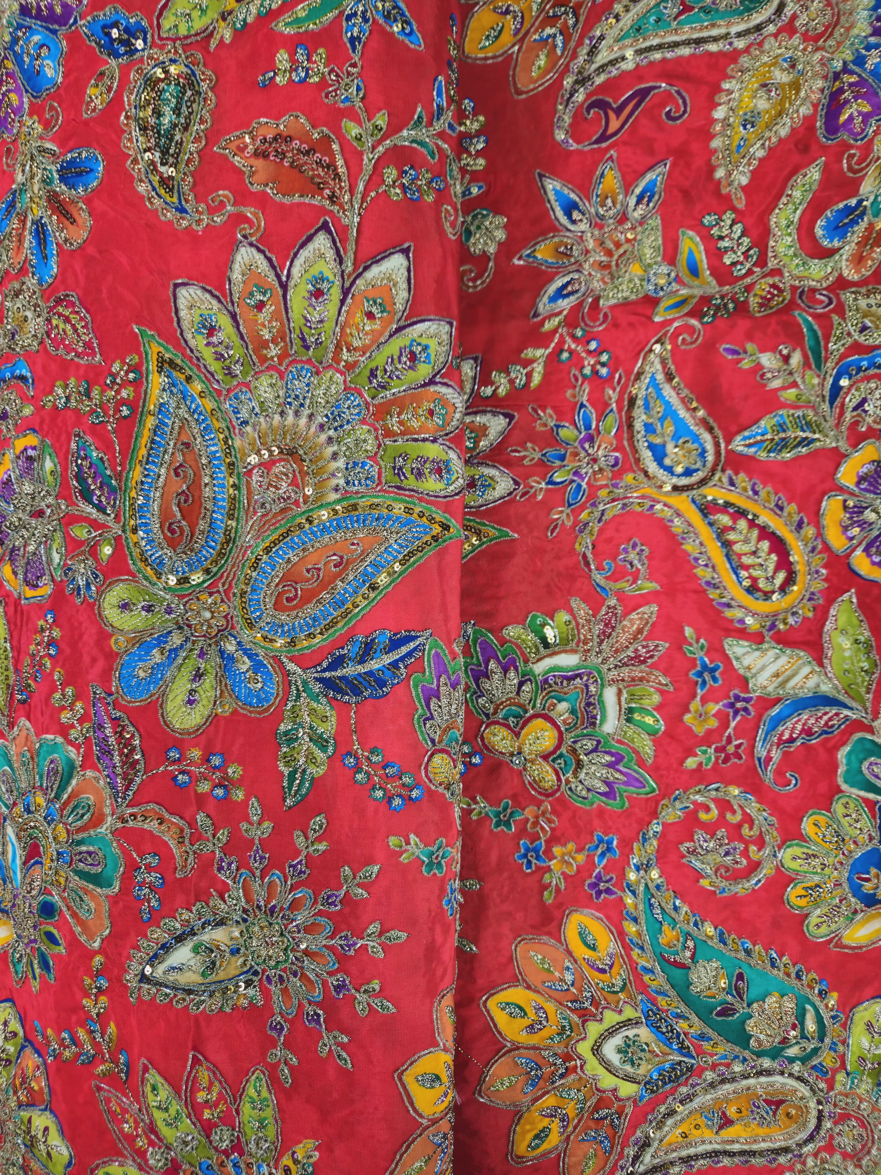 Position Print With Traditional Embroidery On Red Fabric
